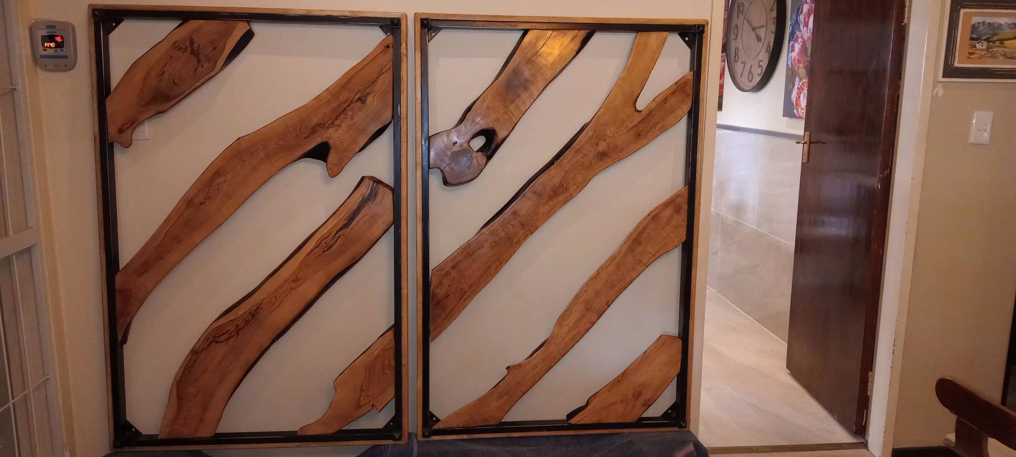 A pair of exceptional headboards with a show-stopping live edge Olive wood ce...