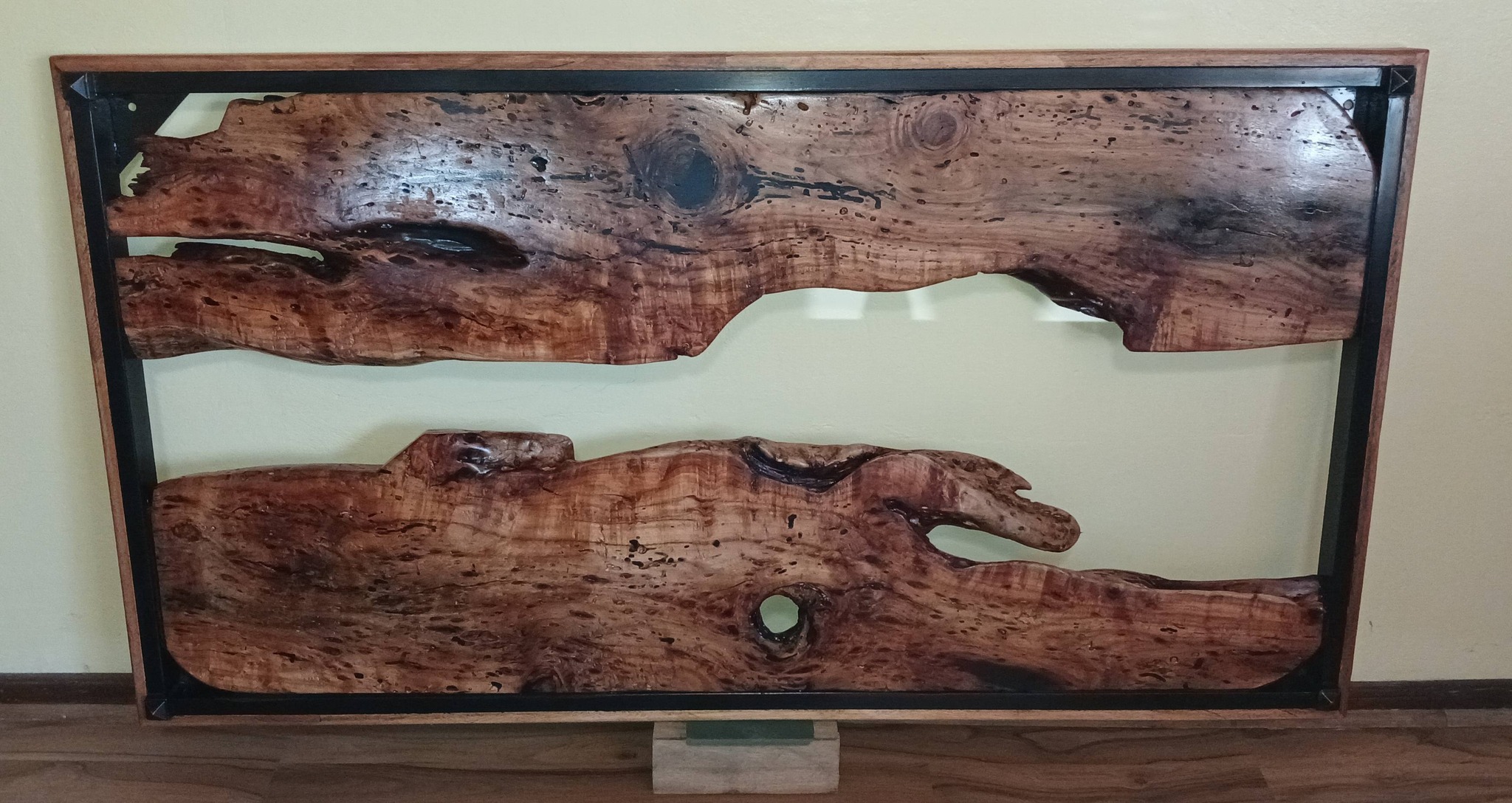 This one-of-a-kind headboard features two exquisite African Jackalberry wood ...